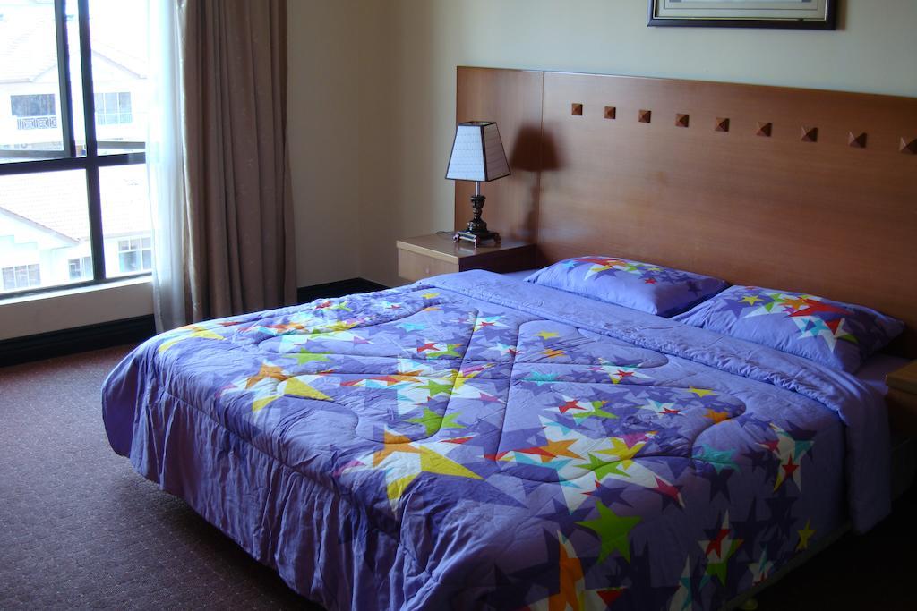 Dorcas Service Apartment - Marina Court Кота-Кінабалу Номер фото